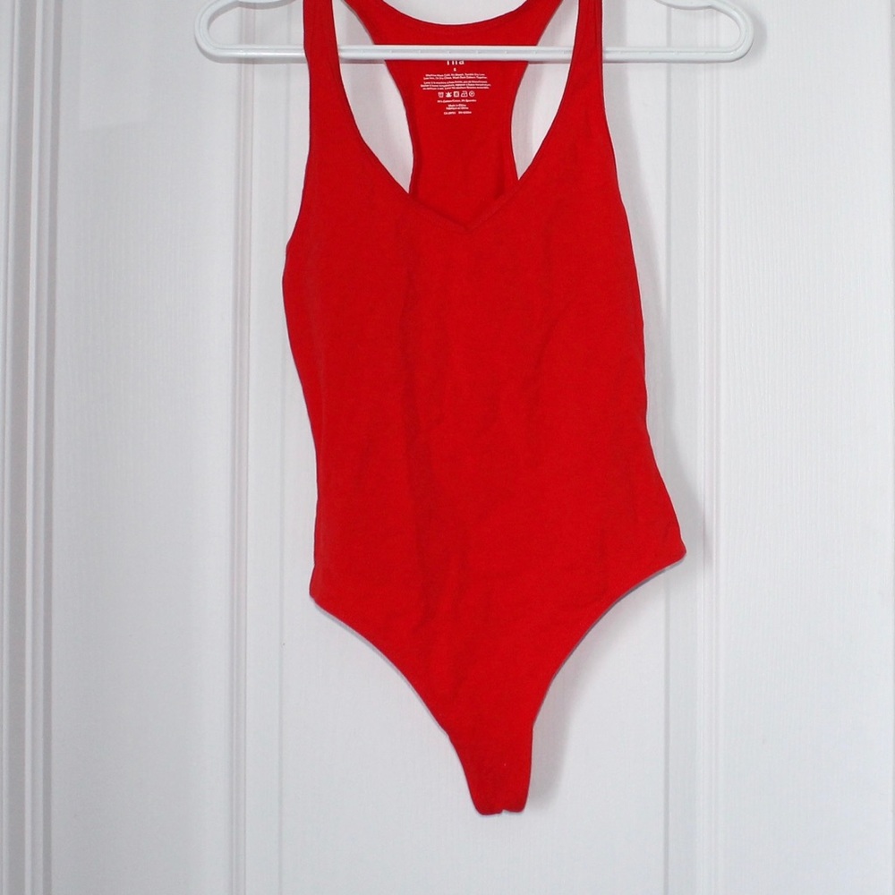 TNA v neck body suit red